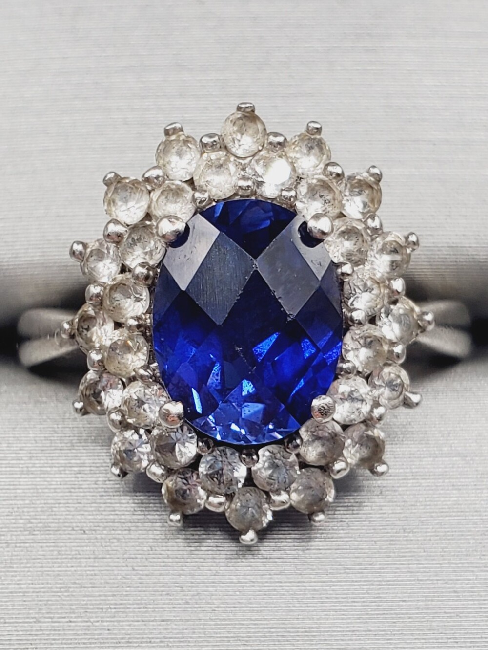 Blue & White Sapphire Oval Halo Cocktail Ring - 925 Sterling Silver